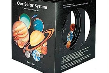 Black set of books about the solar system, "Our Solar System" written on the side.