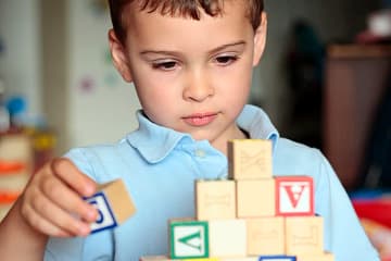 Child playing with blocks