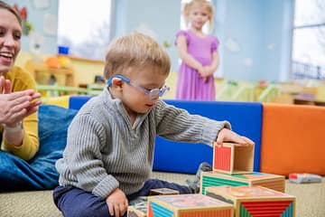 kid playing with safe toys respecting toy safety