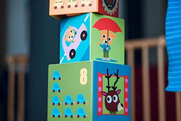 Child selecting educational toys.