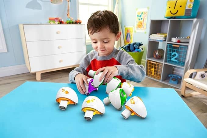 Child coding with his code-a-pillar